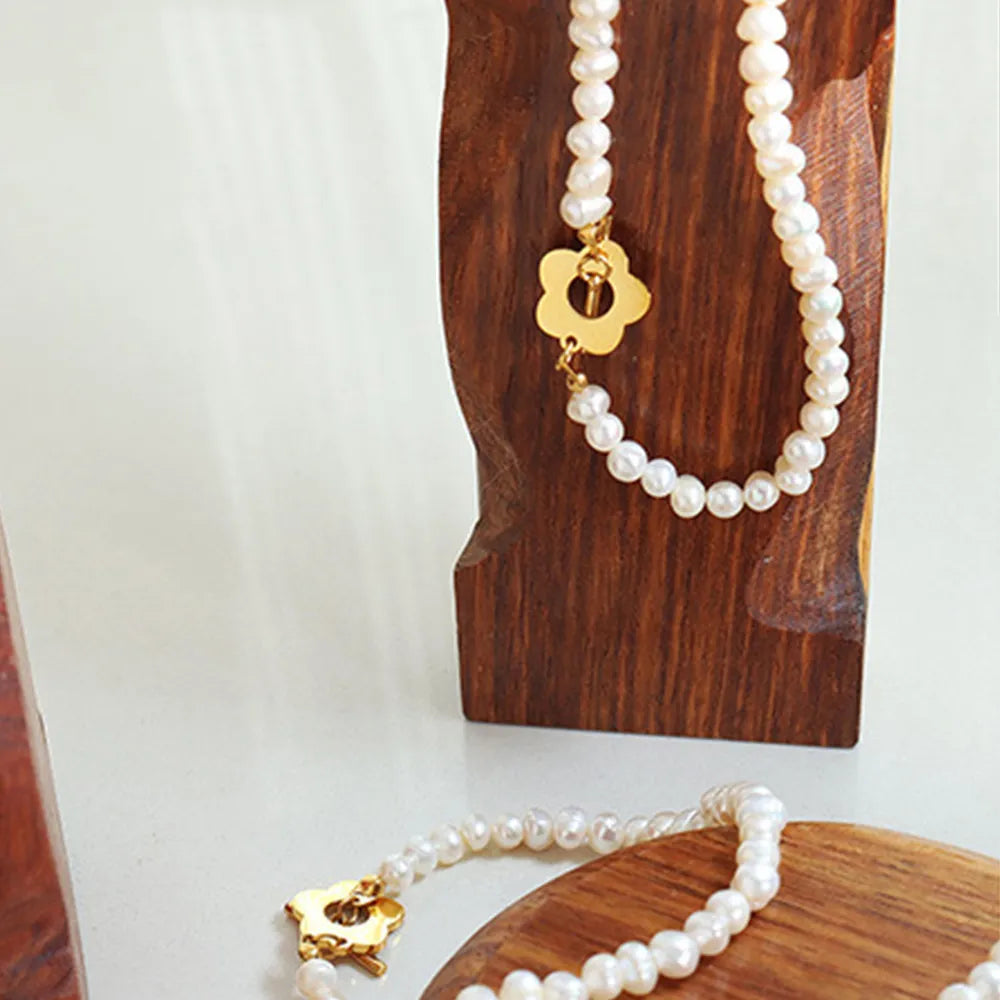 Titanium Steel & Freshwater Pearl Bracelet – Floral Elegance