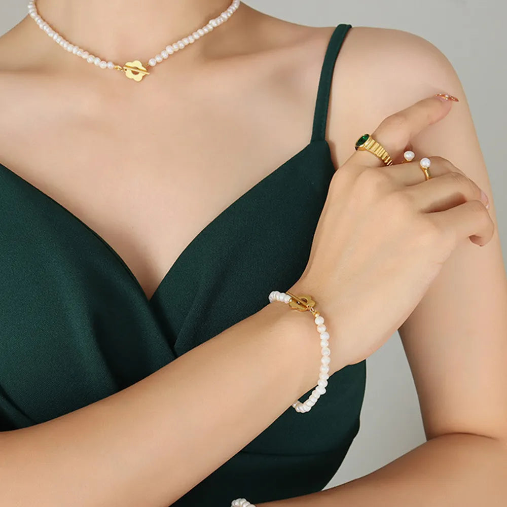 Titanium Steel & Freshwater Pearl Bracelet – Floral Elegance